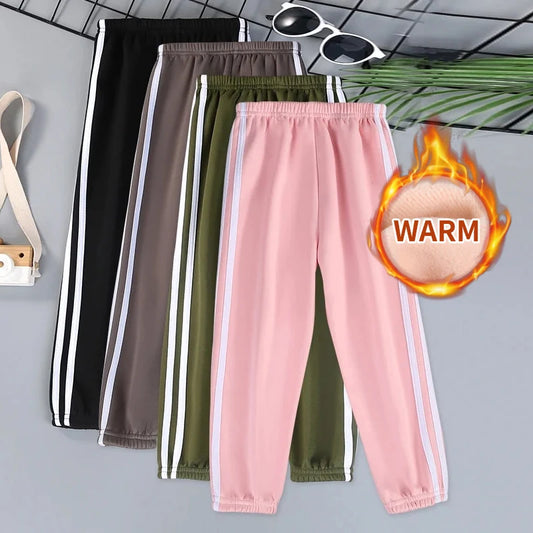 Autumn and winter children's solid color sports plus velvet pants boys and girls comfortable leisure warm sports fashion pants.